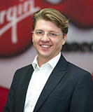 Максим Никитин, Virgin Connect: «Мы утвердили типовые формы договоров для всех компаний группы, при использовании которых согласование идет по сокращенному маршруту»